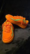 Unchained Bears Orange sneakers with green accent and rope laces