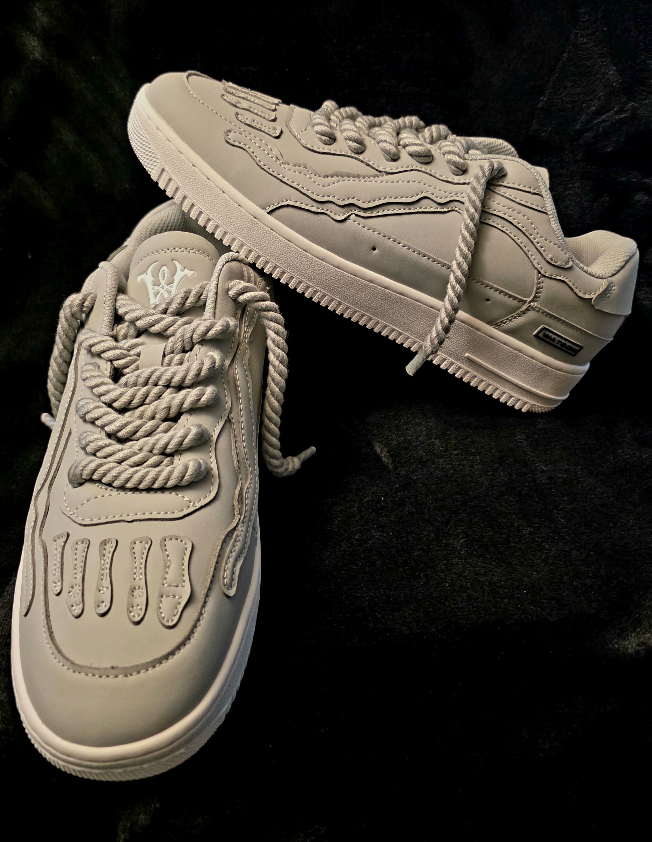 Fog Bones grey minimalist sneakers with rope laces and bone detailing