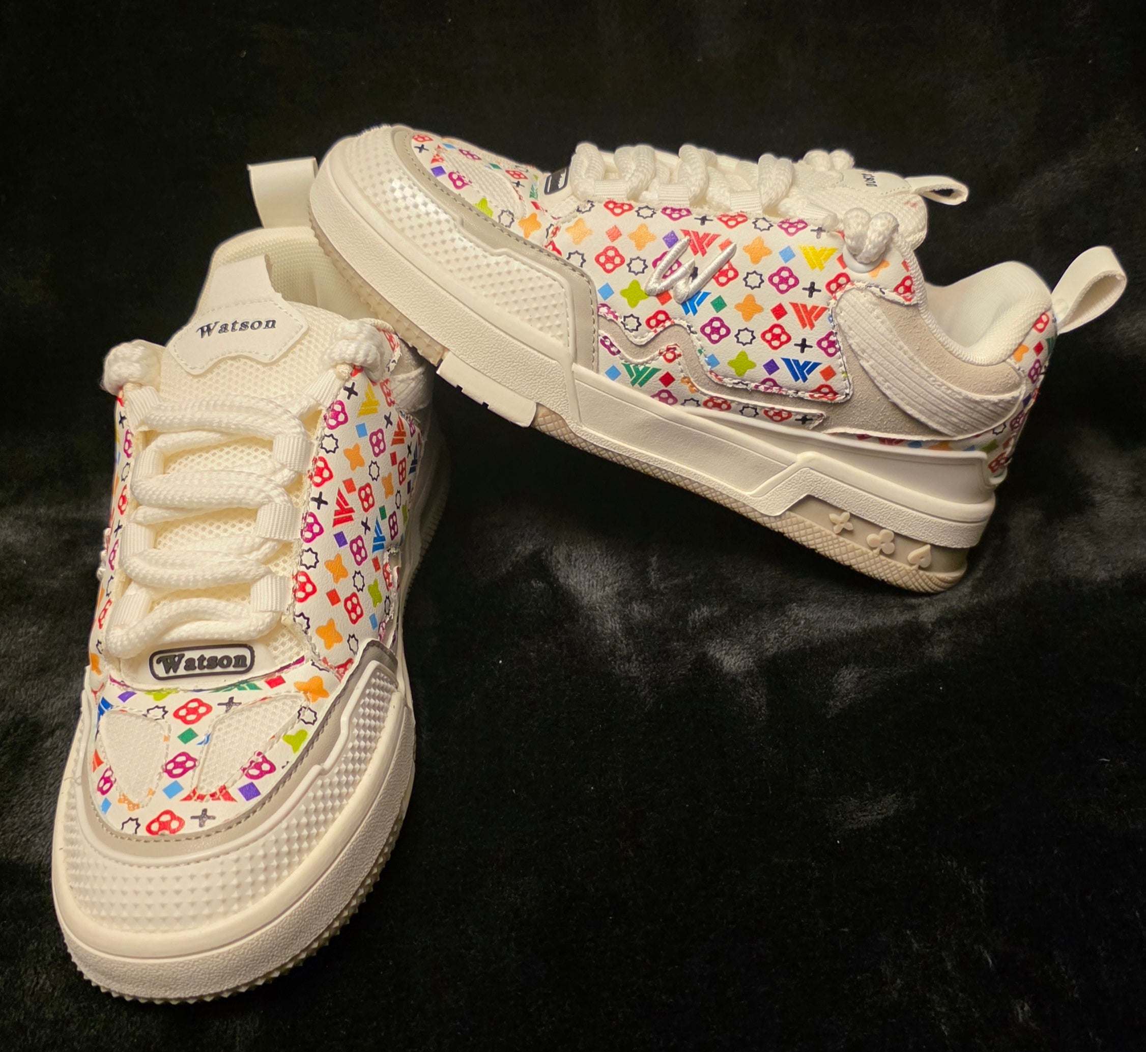 Watson White Monogram K-Flip sneakers pair on dark background