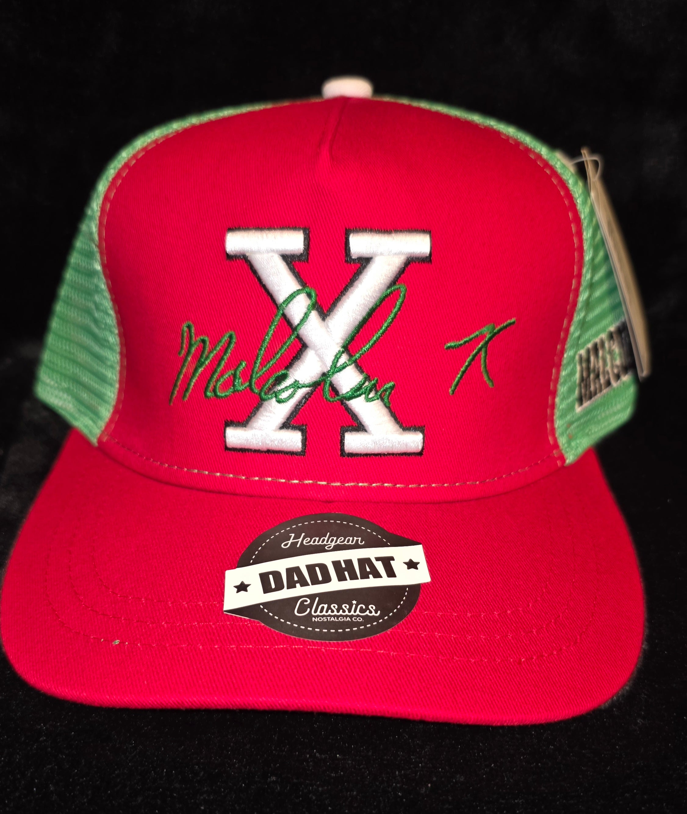 Malcolm X Dad Hat – Red & Green Trucker