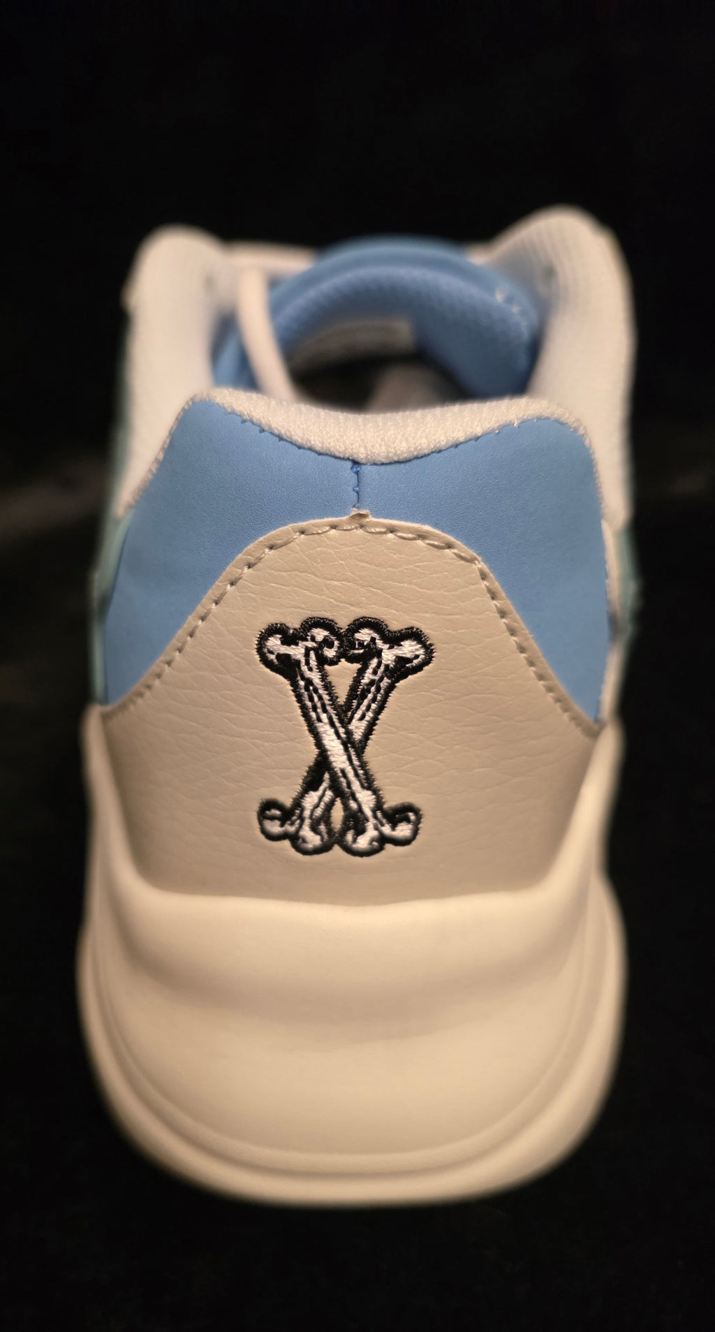 Watson Cosmos Skygazer Men's Sneakers - heel view with embroidered crossbone X logo