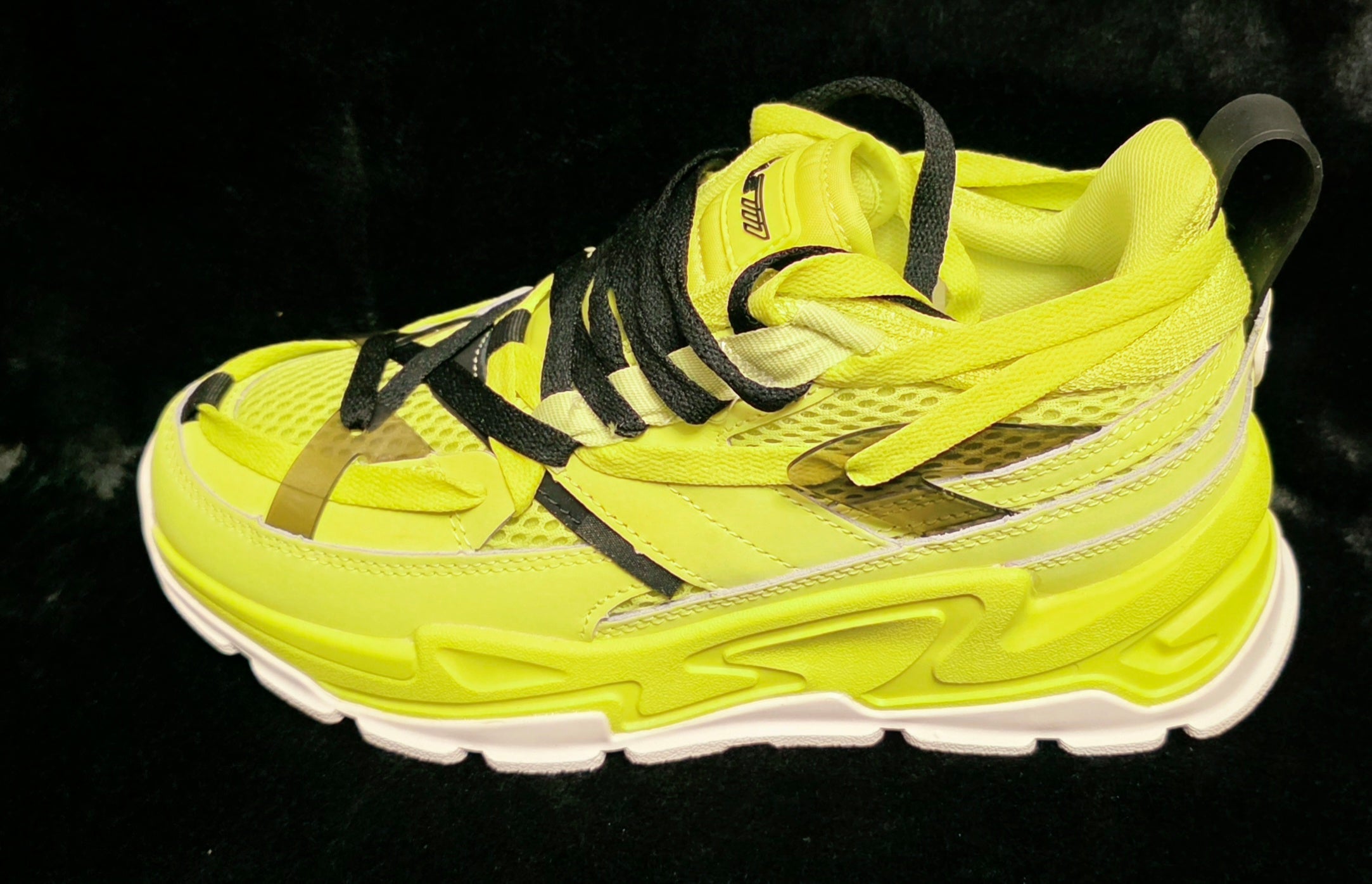Watson Volt Triple Youth Sneakers - side view with black W triple-stripe overlays on neon yellow mesh