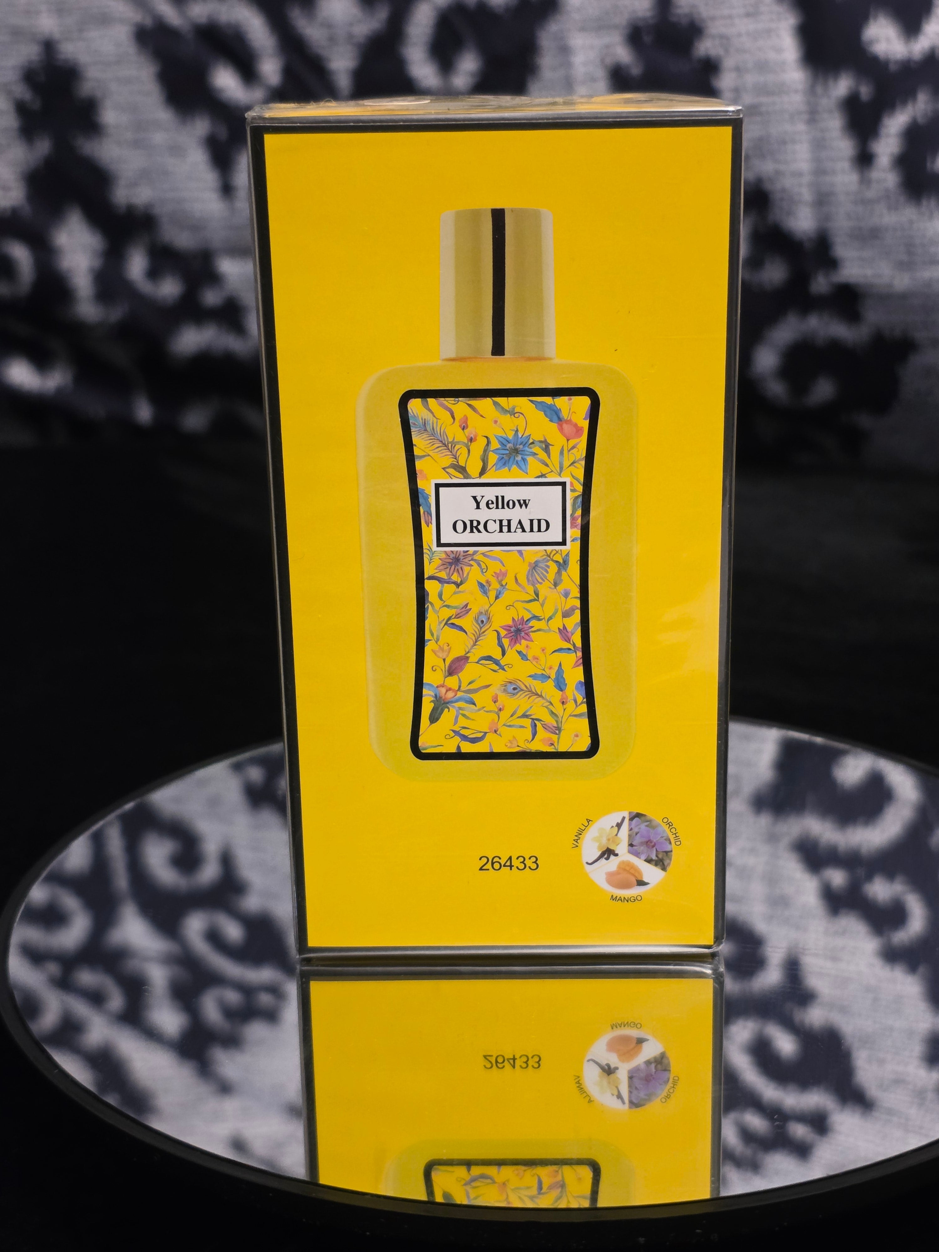 Yellow Orchaid Fragrance Body Mist - vibrant sunshine yellow box with iconic floral botanical bottle print featuring blue cornflowers, purple orchids and tropical leaves