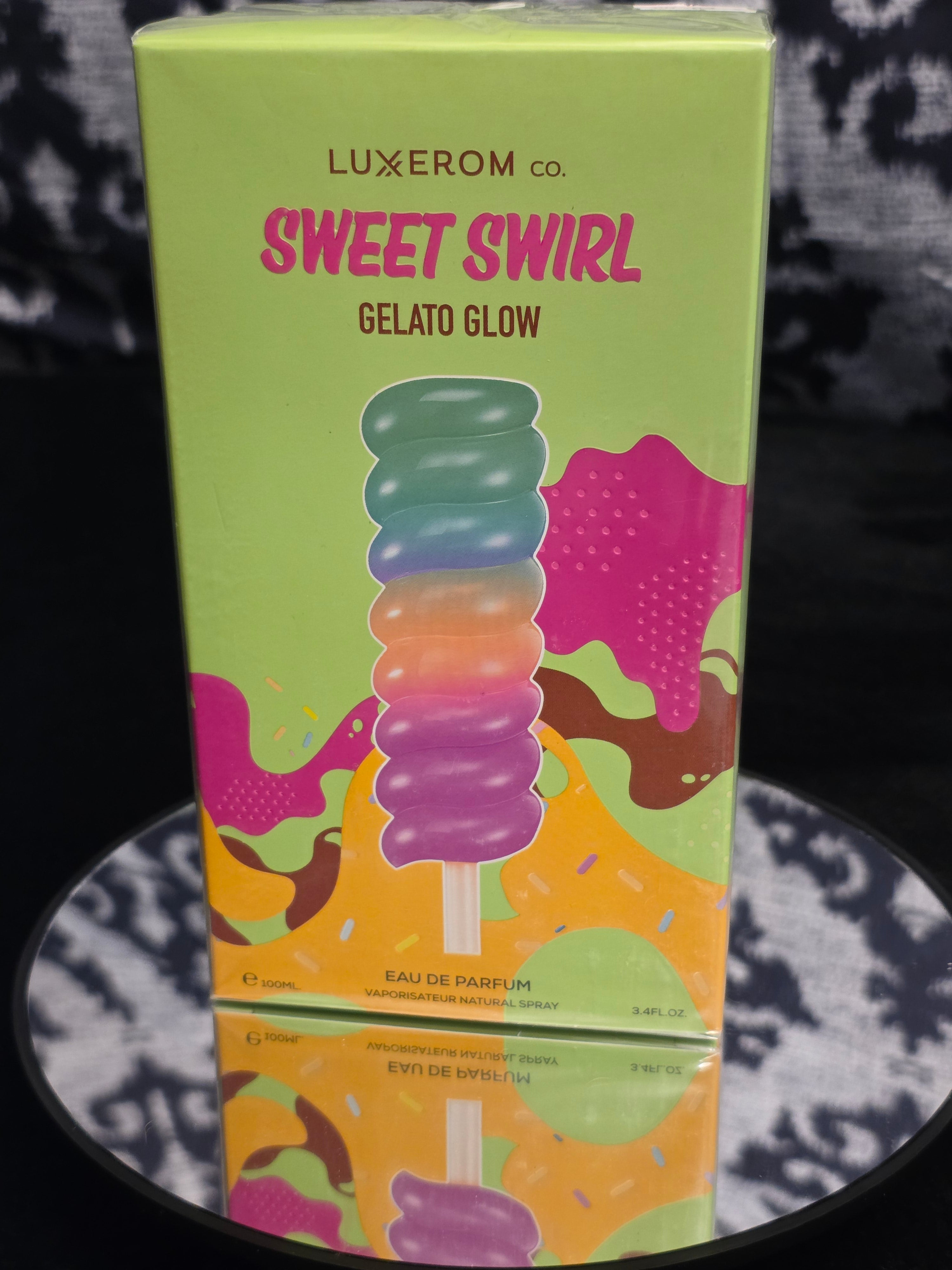 Luxxerom Co. Sweet Swirl Gelato Glow Eau de Parfum 100mL box - vibrant lime green packaging with bold hot pink SWEET SWIRL typography and rainbow gelato popsicle artwork