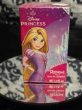 Disney Princess Rapunzel Eau de Toilette 100mL by Air Val - vibrant hot pink Disney Princess box featuring Rapunzel in purple dress with enchanted castle backdrop