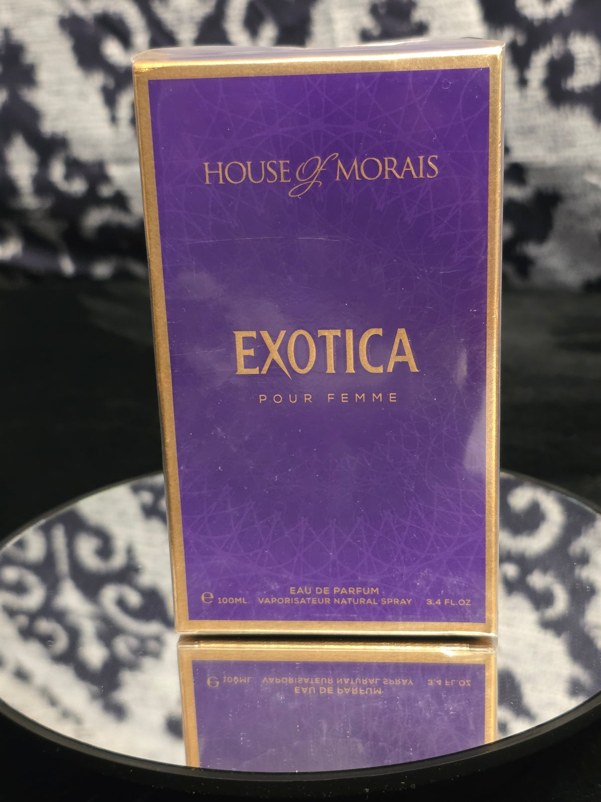 House of Morals Exotica Pour Femme Eau de Parfum 100mL box - rich deep violet purple packaging with bold gold EXOTICA POUR FEMME typography and gold border trim