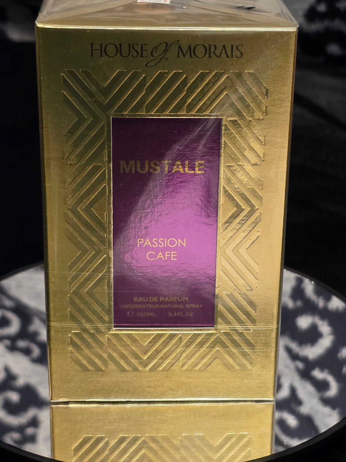 House of Morals Mustale Passion Cafe Eau de Parfum 100mL box - embossed gold Art Deco chevron pattern with deep purple Mustale Passion Cafe label panel