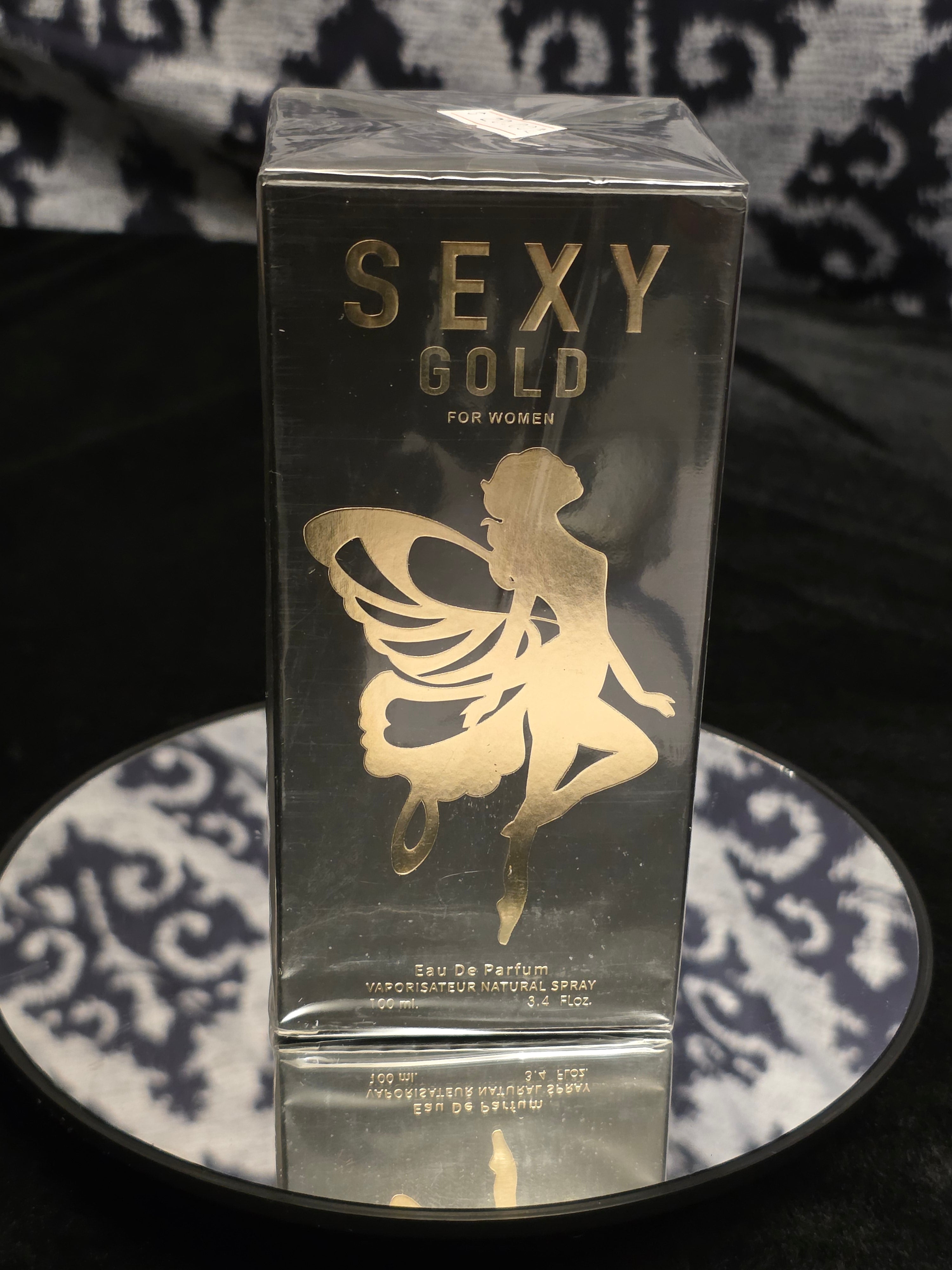 Sexy Gold For Women Eau de Parfum 100mL box - sleek black packaging with bold gold SEXY GOLD typography and gold fairy silhouette artwork