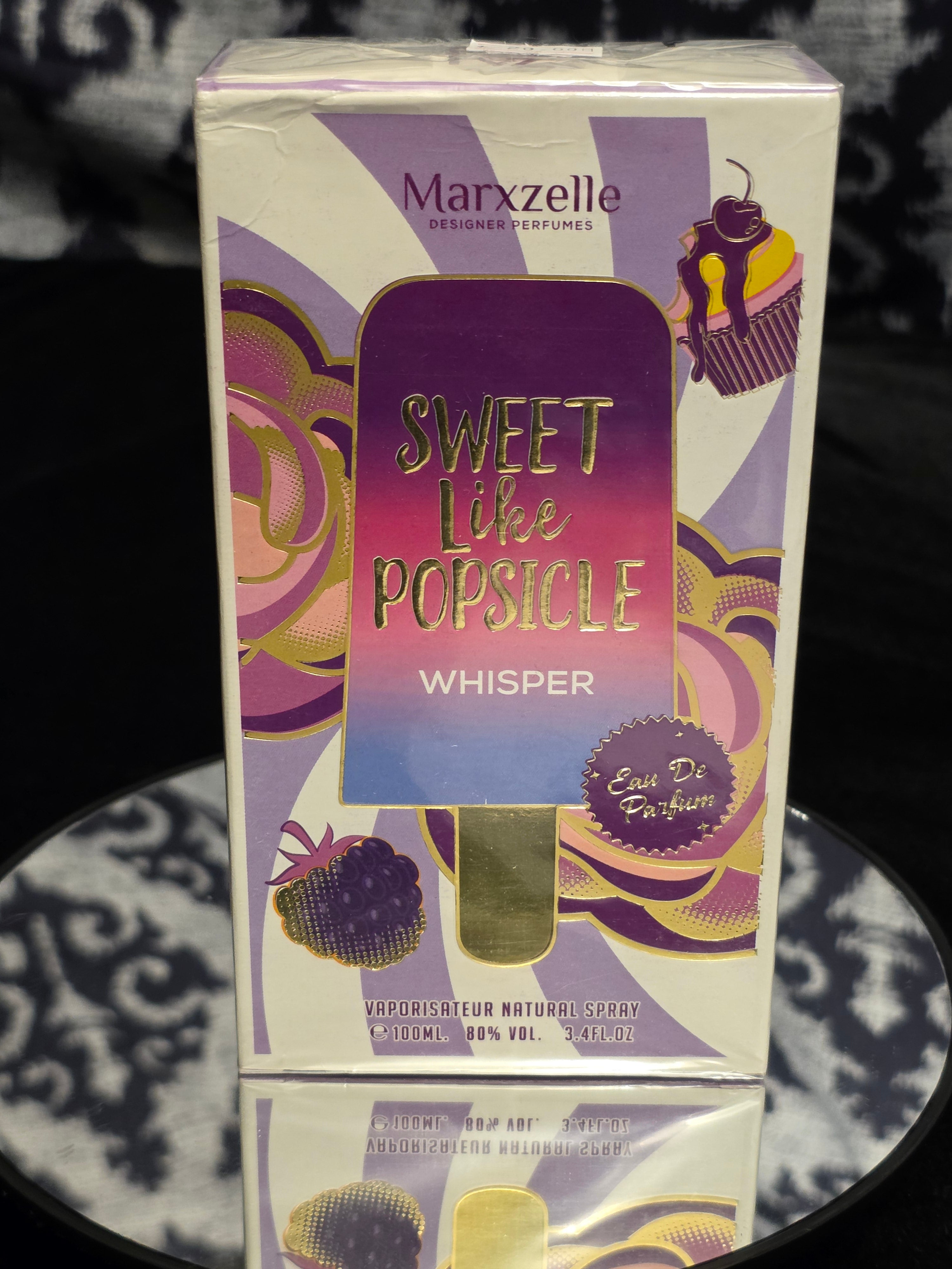 Marxzelle Sweet Like Popsicle Whisper Eau de Parfum 100mL box - vibrant purple lavender swirl packaging with gold popsicle, cupcake and blackberry artwork